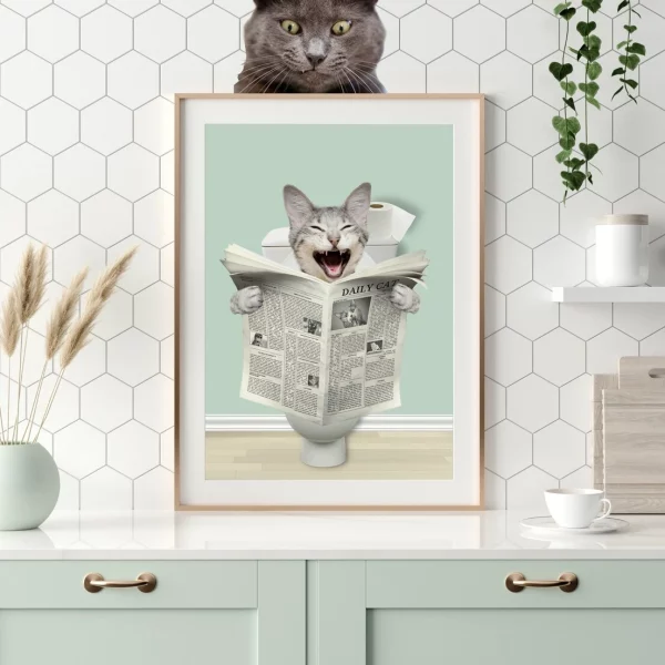 Funny cat reading newspaper in the toilet